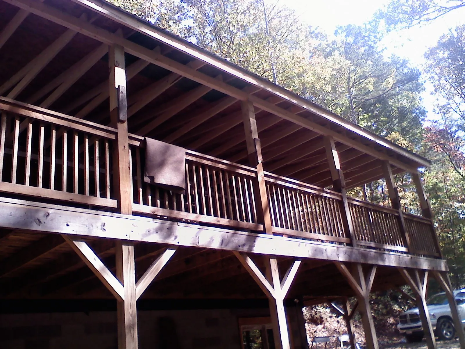 Timber framing under a new elevated porch and deck — Roof Leak Repair in New Riegel by Roofing Brothers